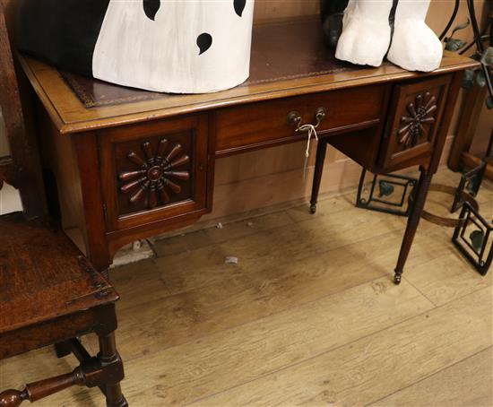 An Edwardian mahogany writing table W.107cm